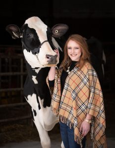 Allie Breunig with one of her cows